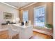 Bright home office featuring hardwood floors, natural light, and modern furnishings at 384 16Th Nw St # 1, Atlanta, GA 30363