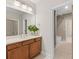 Bathroom featuring a marble vanity with modern fixtures at 6454 Meridian Way, Atlanta, GA 30328