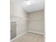 Walk-in closet with wire shelving and neutral carpet at 6454 Meridian Way, Atlanta, GA 30328