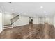 Expansive living area featuring beautiful flooring and an open layout, offering versatility for various design possibilities at 6454 Meridian Way, Atlanta, GA 30328