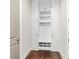 Mudroom with white cabinets, a bench, and cubbies, perfect for storing shoes and coats at 6454 Meridian Way, Atlanta, GA 30328