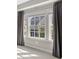 Window with gray blackout curtains at 6454 Meridian Way, Atlanta, GA 30328