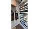 Walk-in closet with custom shelving and storage for organization at 823 Canterbury Overlook, Atlanta, GA 30324