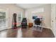 Versatile flex room featuring hardwood floors, a window with natural light, and a padded punching bag for recreation at 823 Canterbury Overlook, Atlanta, GA 30324