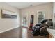 Multi-purpose flex room featuring hardwood floors, an egress door to the outside, and space for recreation and relaxation at 823 Canterbury Overlook, Atlanta, GA 30324