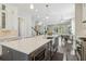 Spacious open concept kitchen with a long center island, stainless steel appliances, and hardwood floors at 823 Canterbury Overlook, Atlanta, GA 30324