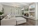 Bright living room with hardwood floors, fireplace and custom built-ins at 823 Canterbury Overlook, Atlanta, GA 30324