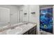 Bathroom with dual sinks, granite countertops and shower with dolphin shower curtain at 1439 Veranda Ln, Mcdonough, GA 30253