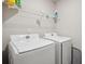 Convenient laundry room with modern, matching washer and dryer units at 1439 Veranda Ln, Mcdonough, GA 30253