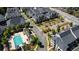 Aerial view of community featuring a pool, common areas, and well-maintained landscaping at 4068 Allegretto Se Cir # 10, Atlanta, GA 30339