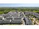 Panoramic aerial view of a residential community surrounded by lush greenery and city skyline at 4068 Allegretto Se Cir # 10, Atlanta, GA 30339