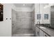 Modern bathroom with a spacious walk-in shower and double vanity at 4068 Allegretto Se Cir # 10, Atlanta, GA 30339
