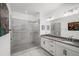 Modern bathroom with a spacious walk-in shower and double vanity at 4068 Allegretto Se Cir # 10, Atlanta, GA 30339
