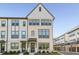 Charming new construction townhome with a brick facade and inviting curb appeal at 4068 Allegretto Se Cir # 10, Atlanta, GA 30339