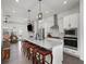 Bright kitchen features an eat-in island with modern appliances and is open to the living area at 4068 Allegretto Se Cir # 10, Atlanta, GA 30339
