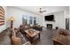 Spacious living room with comfortable seating, fireplace, and hardwood floors at 4068 Allegretto Se Cir # 10, Atlanta, GA 30339
