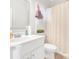Functional bathroom with a light neutral color scheme has a convenient shower and tub at 4580 Cloister Cir, Hampton, GA 30228