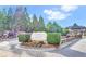 Stone entrance with landscaping, water feature, and attractive signage for Crystal Lake Golf and Country Club at 4580 Cloister Cir, Hampton, GA 30228