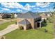 Aerial view of well-maintained home with fenced backyard, manicured lawn and attached garage at 4580 Cloister Cir, Hampton, GA 30228