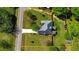 Aerial view of the property with highlighted property lines and surrounding greenery at 925 Wynn Rd, Mcdonough, GA 30252