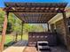 Relax in this backyard oasis with a pergola covered hot tub and a meticulously maintained lawn at 925 Wynn Rd, Mcdonough, GA 30252