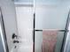 Bathroom featuring a shower and tub combination with sliding glass door at 925 Wynn Rd, Mcdonough, GA 30252