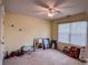 Bright bedroom with neutral walls, a window with blinds and plush carpet at 925 Wynn Rd, Mcdonough, GA 30252