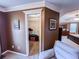 Primary bedroom with a view into a walk-in closet with a light at 925 Wynn Rd, Mcdonough, GA 30252