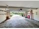 Spacious garage with an open door, providing easy access to the driveway at 925 Wynn Rd, Mcdonough, GA 30252