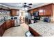 Updated kitchen with granite countertops, stainless steel appliances, and tile backsplash at 925 Wynn Rd, Mcdonough, GA 30252