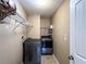 Well-equipped laundry room with modern washer and dryer at 925 Wynn Rd, Mcdonough, GA 30252