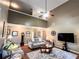 Spacious living room with high ceilings, hardwood floors, neutral paint, and comfortable seating at 925 Wynn Rd, Mcdonough, GA 30252