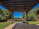 Inviting backyard deck with pergola and ample space for entertaining guests at 925 Wynn Rd, Mcdonough, GA 30252