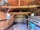 Interior of a storage shed with wood framing, shelving and ladder providing ample storage space at 925 Wynn Rd, Mcdonough, GA 30252