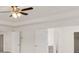 Bright main bedroom with a ceiling fan and white trim at 13580 Whitman Lane, Covington, GA 30014