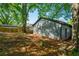 Spacious backyard with a well-maintained lawn and lush green trees at 1430 Fairbanks Sw St, Atlanta, GA 30310