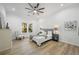 Bright bedroom featuring a ceiling fan and neutral decor, offering a serene retreat at 1430 Fairbanks Sw St, Atlanta, GA 30310