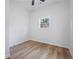 Cozy bedroom with hardwood floors and a bright window providing natural light at 1430 Fairbanks Sw St, Atlanta, GA 30310