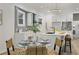 Eat-in kitchen with modern lighting, stainless appliances and island at 1430 Fairbanks Sw St, Atlanta, GA 30310