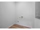 Laundry room featuring washer dryer hookups, new floors and painted walls at 1430 Fairbanks Sw St, Atlanta, GA 30310