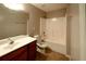 Full bathroom featuring a shower, vanity, and toilet at 2656 Staunton Ln, Duluth, GA 30096