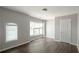Bedroom featuring lots of natural light, hardwood floors, and neutral walls at 2656 Staunton Ln, Duluth, GA 30096