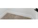 Neutral colored carpet next to clean white walls with modern trim at 332 Gibson Se St, Atlanta, GA 30316