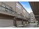 View of townhome exterior with garage and private balcony at 332 Gibson Se St, Atlanta, GA 30316