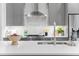Modern kitchen with grey cabinetry, stainless steel appliances and white backsplash at 332 Gibson Se St, Atlanta, GA 30316