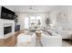 Spacious living room with hardwood floors, a fireplace, and an open view to the deck at 332 Gibson Se St, Atlanta, GA 30316