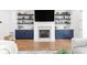 Elegant fireplace with built-in shelves, creating a cozy focal point in the living space at 332 Gibson Se St, Atlanta, GA 30316