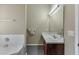 Bathroom with combined tub and shower featuring tile backsplash at 4089 Palm Dr, Snellville, GA 30039