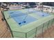 Aerial view of the community tennis courts, featuring well-maintained courts with green and blue surfacing at 4089 Palm Dr, Snellville, GA 30039