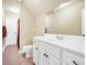 Bathroom featuring tile flooring, toilet, vanity with white cabinets and a mirror at 4111 Alayna Lee Cir, Mcdonough, GA 30252